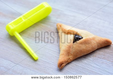 Hamantaschen Cookie And Graggers For Purim Jewish Holiday