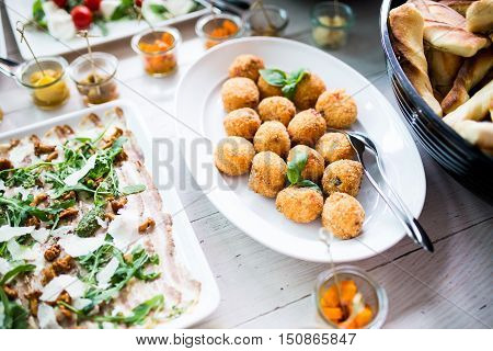 Finger food and snacks at lunch buffet in restaurant