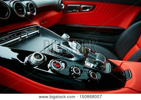 Detail of modern car interior, gear stick, automatic transmission in expensive car