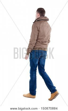Back view of going  handsome man in brown wind breaker. walking young guy . Rear view people collection.  backside view of person.  Isolated over white background.