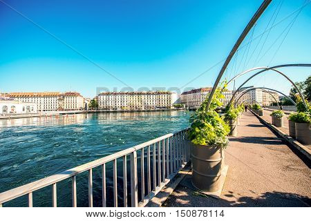 Geneva, Switzerland - June 23, 2016: Bergues pedestrian bridge in the center of Geneva city. Geneva is a financial center and worldwide center for diplomacy in Europe