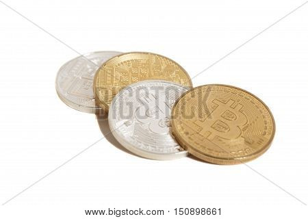 Golden and silver bitcoin coins isolated on white background