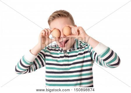 Young Boy Play The Eggs Over The White