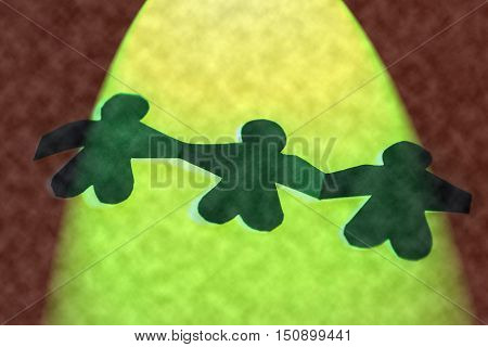 paper people symbole  on yellow background .