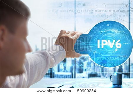 Business, Technology, Internet And Network Concept. Young Businessman Looks On A Tablet, Smart Phone