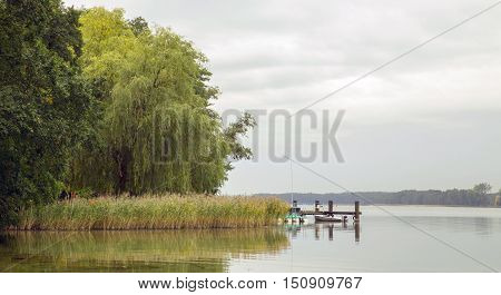 Shore With Landing Stage And Boots On The Werbellinsee