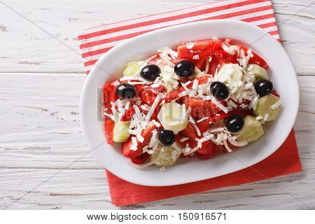 Bulgarian Cuisine: Shopska Vegetables Salad With Feta Closeup On A Plate. Horizontal Top View