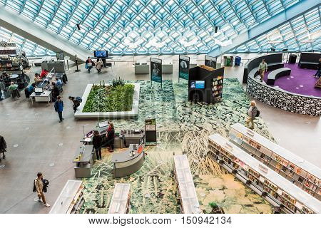 Seattle, USA - April 15, 2016: Aerial view of main floor of the public Central Library with modern glass architecture