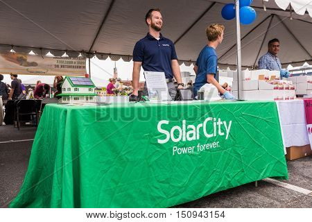 Washington DC, USA - September 24, 2016: SolarCity salesman representative at VegFest festival