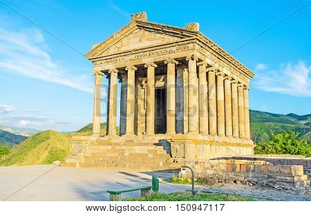 The colonnaded facade of Garni Temple with preserved decors on columns' capitals roof and friezes Kotayk Province Armenia.