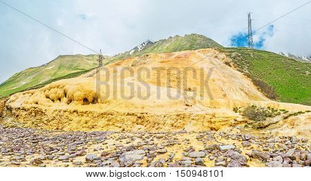 The mineral water stream covered the with traverine deposites Cross Pass Gudauri Georgia.