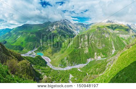 The Aragvi River flows in the deep canyon seen from the Cross Pass Gudauri Georgia.