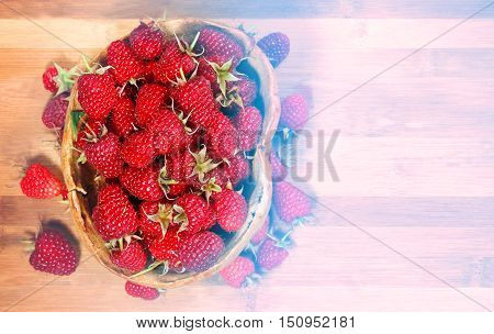 Delicious red raspberries photographed in close up