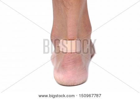 Heel wound with bandage isolated on white