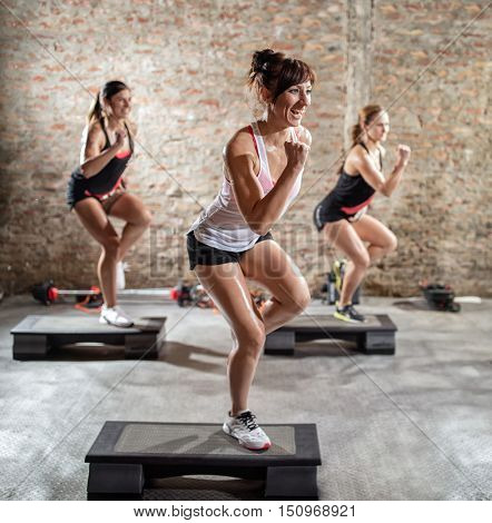 Group of young women  having  step training