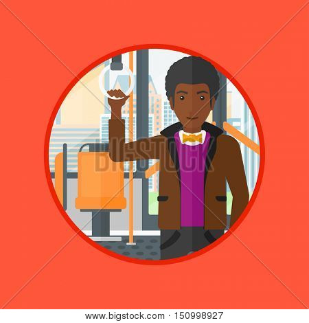 African-american man traveling by public transport. Man standing in a public transport. Man traveling by passenger bus or subway. Vector flat design illustration in the circle isolated on background.