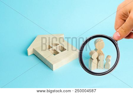 The Family Stands Near The Ruined Fallen House. Loss Of Housing, Home Insurance. Accident, Natural D