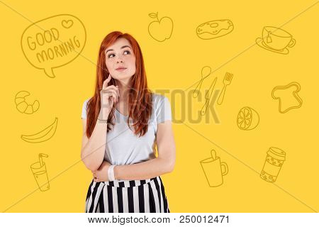 Good Morning. Beautiful Young Girl Thoughtfully Touching Her Face And Smiling While Enjoying Her Rel