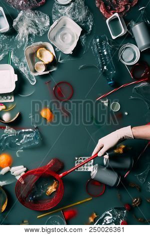 Cropped Shot Of Woman In Latex Glove With Butterfly Net Cleaning Water From Rubbish