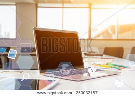 Laptop On The Table In The Meeting Room. Fintech And Technology