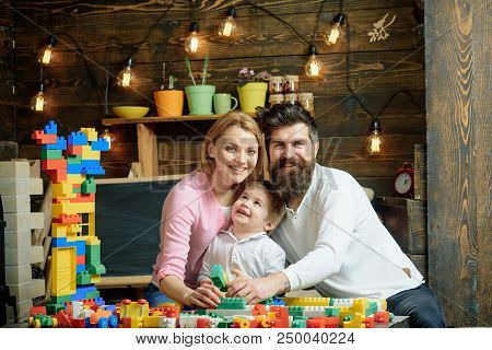 Playschool Concept. Playschool Kid Play With Mother And Father. Happy Family In Playschool. Playscho