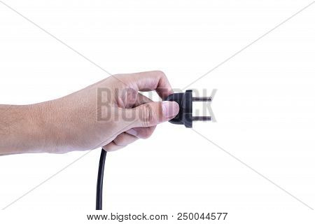 Hand Holding Black Electrical Plug A Removable Cord From A Power Outlet On A White Background. Save