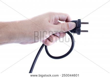 Hand Holding Black Electrical Plug A Removable Cord From A Power Outlet On A White Background. Save