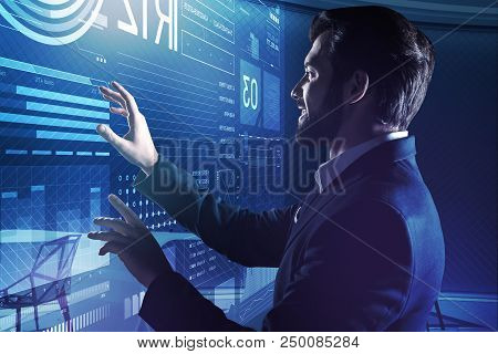 Smiling Database Administrator. Cheerful Emotional Database Administrator Feeling Satisfied With The