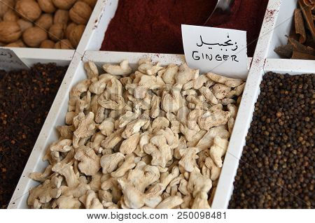 Oriental Spices. Fresh, Sticking Roots Of Ginger In A Box And Another Spices