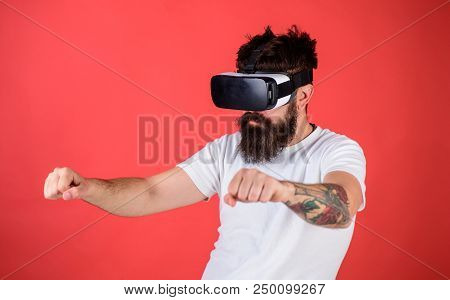 Virtual Driving Lessons Concept. Hipster On Confident Face Driving Bike In Virtual Reality With Mode