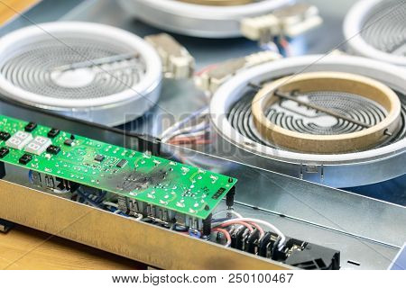 Burnt Green Microchip After Short Circuit Due To Water Damage. Damaged Overheat Control Panel Board 