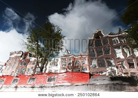 Only The Reflection Of The City And Buildings In The Water