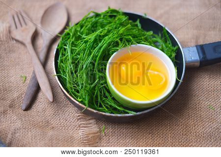 Ingredient For Fried Acacia Pennata Omelet (fresh Egg And Leaf Pennata)