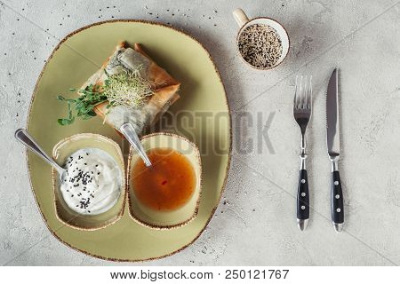 Flat Lay With Samosas In Phyllo Dough Stuffed With Spinach And Paneer Decorated With Germinated Seed