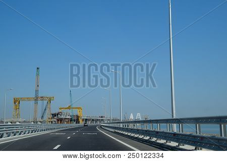 Crimean Bridge, Taman, Russia - July 9, 2018: Driving Along The Crimean Bridge. A Grandiose Building