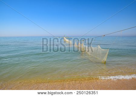 Fishing Nets Set In The Sea. Fishing Nets.