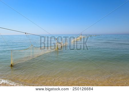 Fishing Nets Set In The Sea. Fishing Nets.