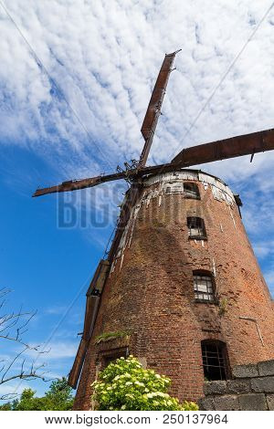 Zdrzewno, Poland- 08 June 2014: Dutch Windmill From 1765. From The Fourteenth Century Belonged To Th