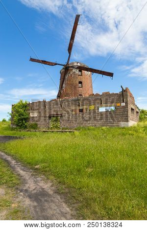 Zdrzewno, Poland- 08 June 2014: Dutch Windmill From 1765. From The Fourteenth Century Belonged To Th