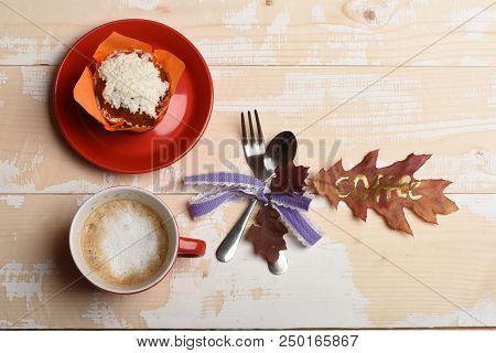 Leaf With Word Coffee Written On. Red Ceramic Tableware With Coffee, Top View. Cup Of Cappuccino Cof