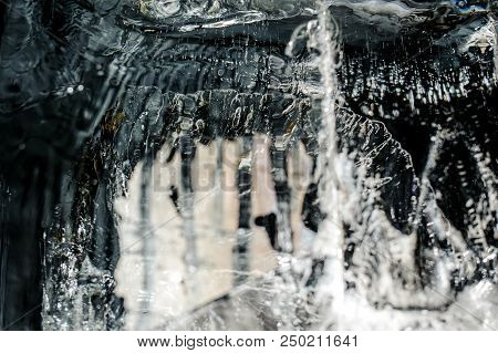Texture Of A Big Clear Ornate Ice Cube With A Small Veinlets Inside It For A Beautiful Background
