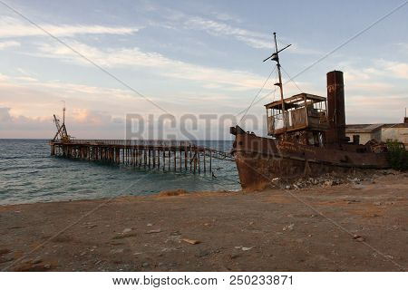 Old Cmc Ship Wreck And Old Pier In Cyprus Depicting Old And Vintage