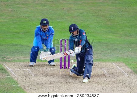 LEEDS, ENGLAND - JULY 17: MS Dhoni and Joe Root during the 3rd Royal London One day International match between England and India at Headingley Cricket Ground on July 17, 2018 in  England.