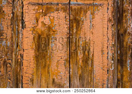 Old Boards With Cracked Rusty Paint. Textured Wooden Old Background With Vertical Lines.