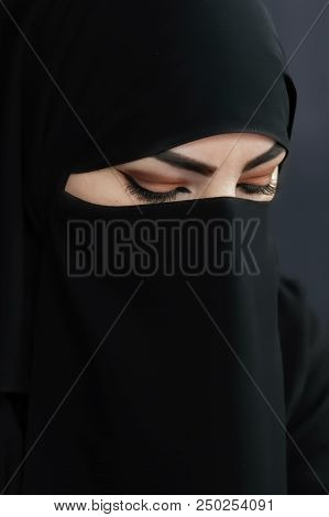 Moscow, Russia - July 14, 2018: Portrait Of An Arabic Young Woman From Qatar In Traditional Islamic 