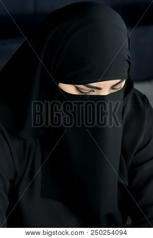 Moscow, Russia - July 14, 2018: Portrait Of An Arabic Young Woman From Qatar In Traditional Islamic 
