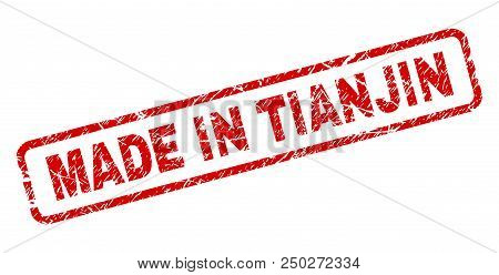 Made In Tianjin Stamp Seal Print With Scratced Style. Red Vector Rubber Print Of Made In Tianjin Tex