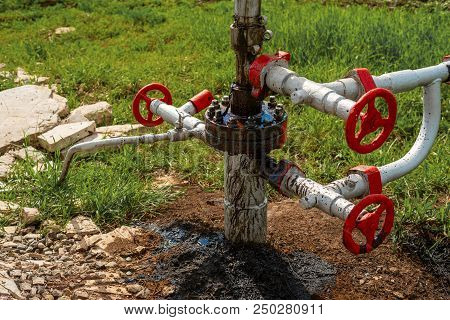 Crude Oil Leak In An Oil Well. Environmental Pollution, Ecology