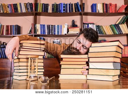 Overstudied Concept. Teacher Or Student With Beard Fall Asleep On Books, Defocused. Man On Sleeping 