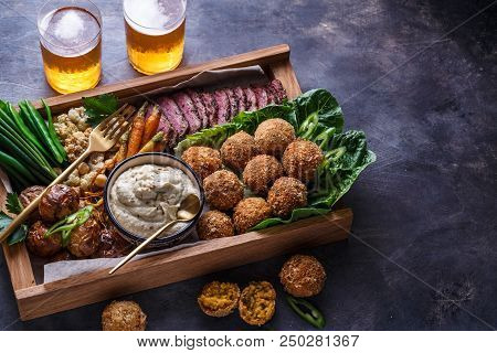 Arabian Meze Food Falafel, Beef, Babaghanous, Fried Cauliflower And Beans